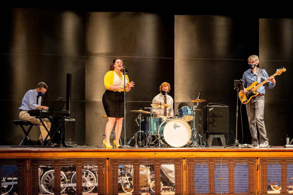 On stage in a nearly empty ballroom at Ogden's Union Station.